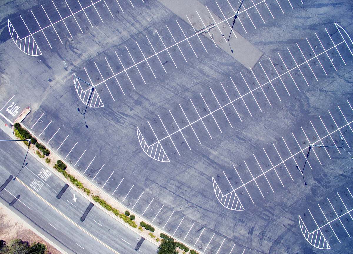 road bird's eye view photo of gray road drone view